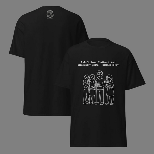 Funny men's sarcastic dating humor novelty tee, casual streetwear  graphic t-shirt showing the front and back view, featuring a funny confidence illustration. Perfect as a sarcastic manifestation joke or funny gift for friends, with the quote: "I don't chase. I attract. And occasionally ignore — balance is key."
