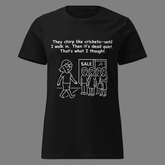 Funny women's sarcastic attitude confidence humor novelty tee, casual streetwear  graphic t-shirt featuring a confident woman walking past a gossiping group line art illustration. Perfect as a witty social confrontation joke or funny gift for friends, with the quote: "They chirp like crickets—until I walk in. Then it's dead quiet. That's what I thought."